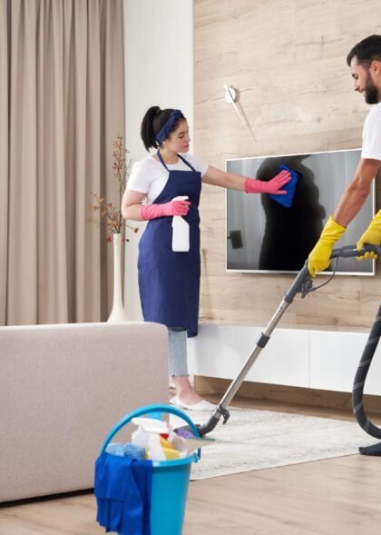 professional-cleaning-service-team-cleans-living-room-modern-apartment